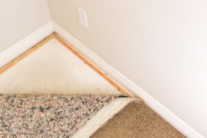 pulled back carpet and padding after a flooding
