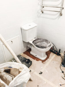 bathroom under construction after sewage backup