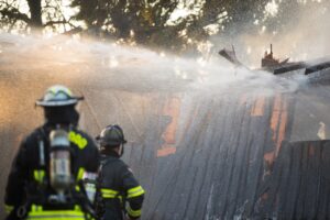 firefighters putting out a house fire